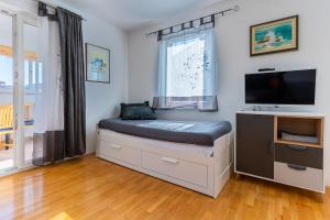 Ліжко або ліжка в номері Apartment Kristian
