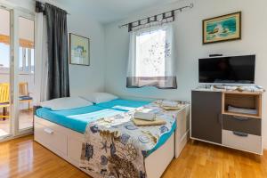 Ліжко або ліжка в номері Apartment Kristian