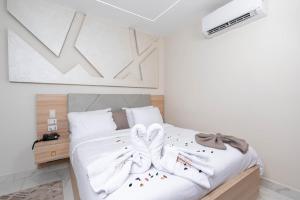 Кровать или кровати в номере Camel Pyramids View Inn