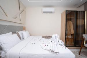 Кровать или кровати в номере Camel Pyramids View Inn