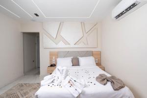 Кровать или кровати в номере Camel Pyramids View Inn