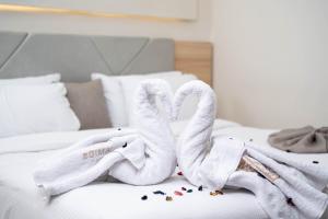 Кровать или кровати в номере Camel Pyramids View Inn