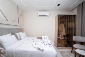 Кровать или кровати в номере Camel Pyramids View Inn