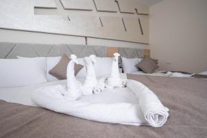 Кровать или кровати в номере Camel Pyramids View Inn