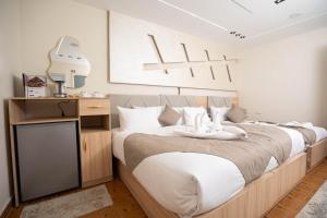 Кровать или кровати в номере Camel Pyramids View Inn
