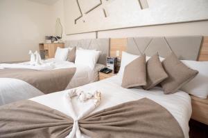 Кровать или кровати в номере Camel Pyramids View Inn