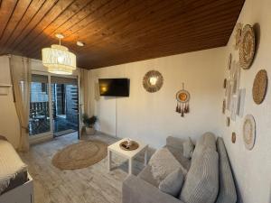 Posezení v ubytování BOHO Apartment Skye