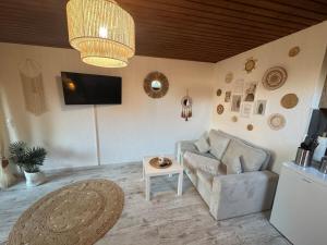 Posezení v ubytování BOHO Apartment Skye