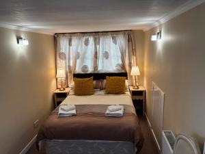 Postel nebo postele na pokoji v ubytování Netherby Guest House Edinburgh + 23 fotografií