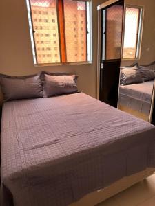 Postel nebo postele na pokoji v ubytování Apartamento 2 quartos no centro de Valparaizo