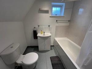 Ένα μπάνιο στο The Shoe Inn Rooms