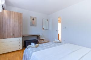 Ліжко або ліжка в номері Apartment Kristian