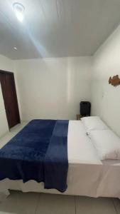 Katil atau katil-katil dalam bilik di Casa do Arnaldinho