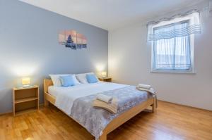 Ліжко або ліжка в номері Apartment Kristian