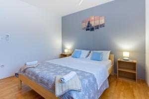 Ліжко або ліжка в номері Apartment Kristian
