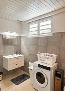Vannituba majutusasutuses Appartement lilas