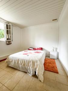 Postel nebo postele na pokoji v ubytování Appartement lilas