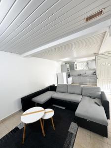 Kuchyň nebo kuchyňský kout v ubytování Appartement lilas
