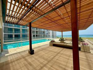 Bazén v ubytování Moderno apartamento en salinas del mar, con vista al mar nebo v jeho okolí + 47 fotografií