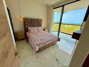 Postel nebo postele na pokoji v ubytování Moderno apartamento en salinas del mar, con vista al mar