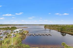an aerial view of a river with a dock at Pinnacle Port A-506 in Carillon Beach