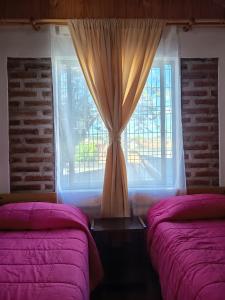 Katil atau katil-katil dalam bilik di Hostal Julia