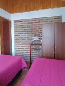Katil atau katil-katil dalam bilik di Hostal Julia