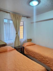 Katil atau katil-katil dalam bilik di Hostal Julia