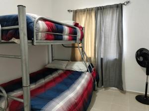 Giường trong phòng chung tại Apartment with a shared pool in a condominium +7 ảnh