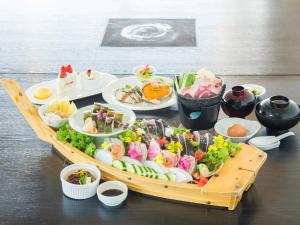 a tray of food on a table with a plate of food at Umibe no Kajuen - Vacation STAY 17483v in Konan