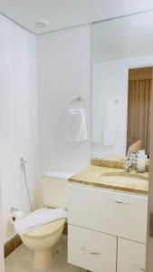 Koupelna v ubytování HOTEL PERDIZES - FLAT Executivo - 1206