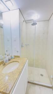 Koupelna v ubytování HOTEL PERDIZES - FLAT Executivo - 1206