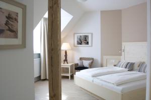 Postel nebo postele na pokoji v ubytování Mein Inselhotel