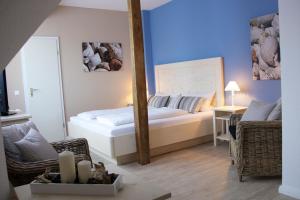 Postel nebo postele na pokoji v ubytování Mein Inselhotel