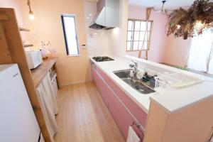 Köök või kööginurk majutusasutuses Coral Suite YAKA +48 fotot