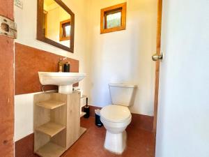Baðherbergi á Hostal RustiKo Experiencias
