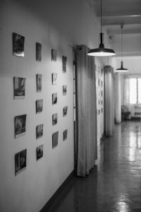 a hallway with pictures on the wall of a room at Fortuna Bungalows in Kandy +43 photos