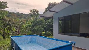 a view from the balcony of a house at Eco Retiro La Paz in Vergara