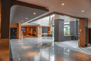 Et sittehjørne på Hotel KIMAYA Slipi Jakarta By HARRIS