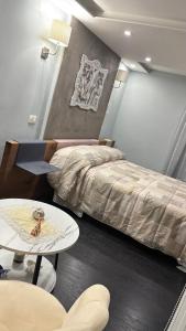 Postel nebo postele na pokoji v ubytování La Maison2