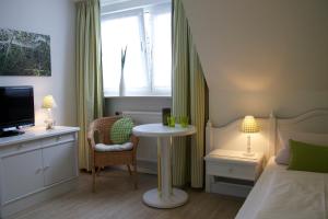 Postel nebo postele na pokoji v ubytování Mein Inselhotel