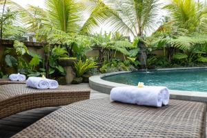 Bazén v ubytování Edge of Ubud by Pramana Villas nebo v jeho okolí