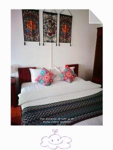 Ein Bett oder Betten in einem Zimmer der Unterkunft Phong lack Guest House
