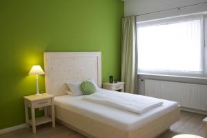Postel nebo postele na pokoji v ubytování Mein Inselhotel