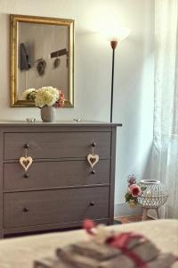 Postel nebo postele na pokoji v ubytování La casina in Via Fiorita