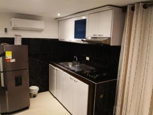 Köök või kööginurk majutusasutuses Hotel Ucla Center