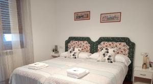 Posteľ alebo postele v izbe v ubytovaní Anguiano Habitaciones rurales con baño privado