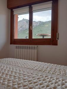 Posteľ alebo postele v izbe v ubytovaní Anguiano Habitaciones rurales con baño privado
