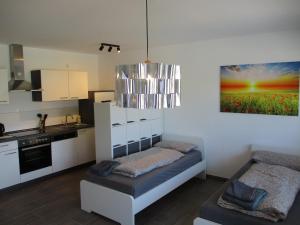 Η κουζίνα ή μικρή κουζίνα στο PARSBERGER Ferienwohnung 4