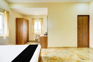 Postel nebo postele na pokoji v ubytování Super Hotel O Sriperambadhur formerly Radha Residency